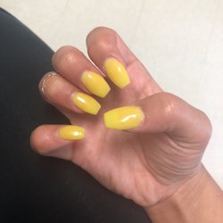 Nails Xp - (See previous review!) Let's also keep in mind I got these done less than 24 hours ago... she put them this far from my cuticle.