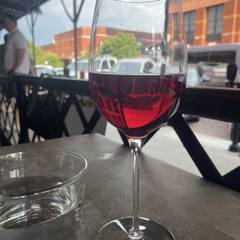 Gather - Wine and view from the patio - New American Near Me - Omaha, Nebraska Gather - Wine and view from the patio - New American Near Me - Omaha, Nebraska