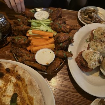 Saluggi's East - Buffalo Chicken Wings Pink Pizza Pizza Burger Sliders - Pizza Near Me - New York, New York
