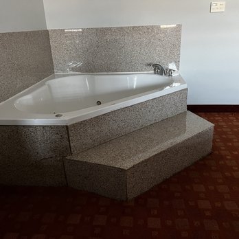 La Quinta by Wyndham Alice - Jacuzzi in room with about 5ft of damp smelly carpet around it. - Hotels Near Me - Alice, Texas La Quinta by Wyndham Alice - Jacuzzi in room with about 5ft of damp smelly carpet around it. - Hotels Near Me - Alice, Texas
