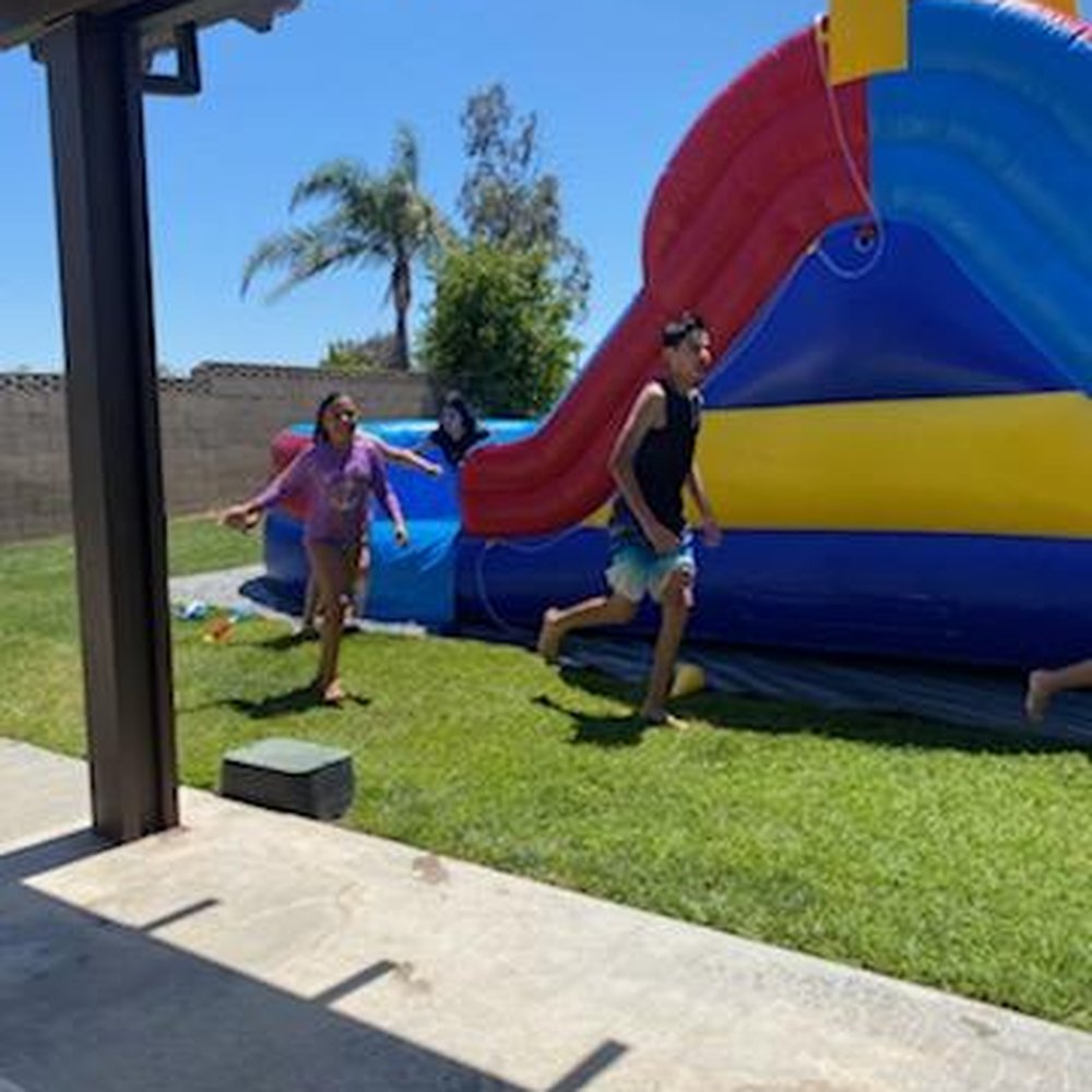 Jumpy Jumps Party Rentals - Racing to who gets to go through the slip n slide 1st. - Party Equipment Rentals Near Me Jumpy Jumps Party Rentals - Racing to who gets to go through the slip n slide 1st. - Party Equipment Rentals Near Me