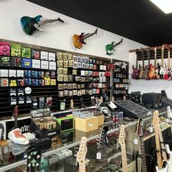 Zimm's Guitars - The counter. Staffed by really nice people.