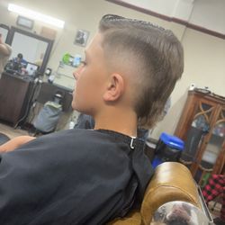 Privileged Professional Barbershop - High Burst fade brought to life by Blends By E aka Erika