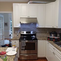Righthand Handyman - Kitchen hood and and tile install behind stove