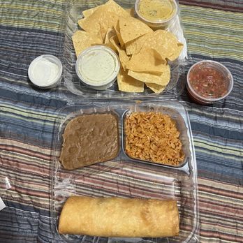 Chuy's - ChuyChanga Chicken, refried beans, Mexican rice, tortillas and sauces plus the BoomBoom sauce. - Bars Near Me - Pembroke Pines, Florida