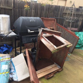 Junk Responders - More junk..moved it outside the fence by the boat. - Junk Removal & Hauling Near Me Junk Responders - More junk..moved it outside the fence by the boat. - Junk Removal & Hauling Near Me