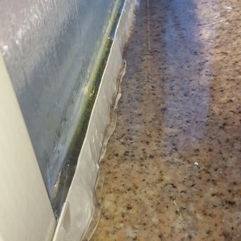 Best Western Des Plaines Inn - Ice inside pool room windowsill was probably an inch thick - Hotels Near Me - Des Plaines, Illinois