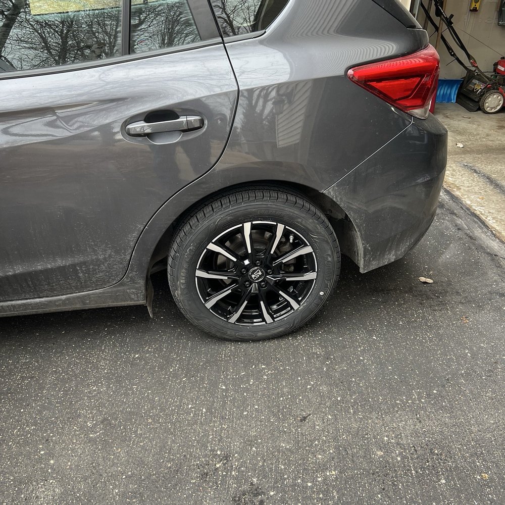 One of the new tires and new rims. One of the new tires and new rims.