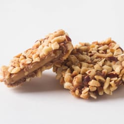 Trappistine Quality Candy - Butter Nut Munch - buttery toffee coated in chocolate and generously finished with chopped hazelnuts
