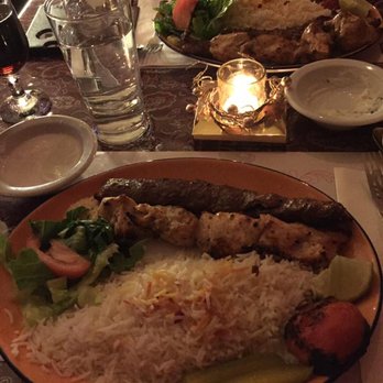 Persepolis - a plate of food on a table - Persian/Iranian Near Me - Sherbrooke, Quebec Persepolis - a plate of food on a table - Persian/Iranian Near Me - Sherbrooke, Quebec