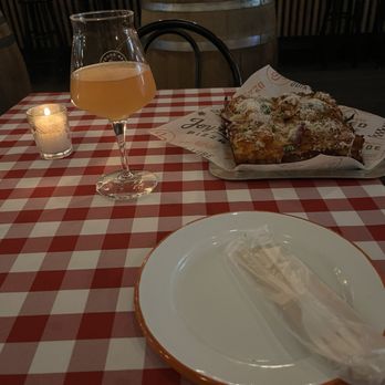 Woods Lowside - Table setting with pizza and beer - Wine Bars Near Me - San Francisco, California