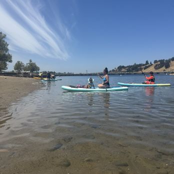 Lake Natoma - People padding boarding on Lake Natoma Recreational Park in Folsom. A perfect day. This is a water sport for all ages. Julie A - Lakes Near Me - Folsom, California Lake Natoma - People padding boarding on Lake Natoma Recreational Park in Folsom. A perfect day. This is a water sport for all ages. Julie A - Lakes Near Me - Folsom, California