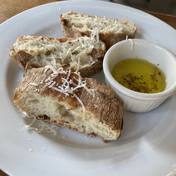 Tre Trattoria - Warm bread with olive oil - Italian Near Me - San Antonio, Texas Tre Trattoria - Warm bread with olive oil - Italian Near Me - San Antonio, Texas