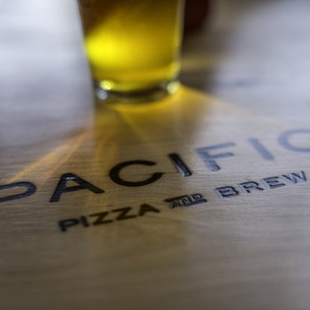 Pacific Pizza & Brew - a glass of beer - Pizza Near Me - Bend, Oregon