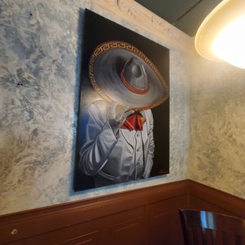 El Tapatio - a painting of a man in a sombren - Mexican Near Me - Merrimack, New Hampshire