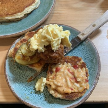 Bearcat CBD - Hot Chicken Biscuit with side of pancakes in the corner. - Coffee & Tea Near Me - New Orleans, Louisiana