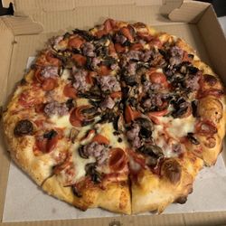 Pepperoni, sausage and mushroom pizza