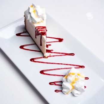 Intrigued Restaurant - house cheesecake - Lounges Near Me - Arlington, Texas Intrigued Restaurant - house cheesecake - Lounges Near Me - Arlington, Texas