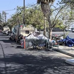 The Riley Youth Club - Right in front of the new location, a homeless camp.