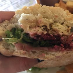 Blue Pub Methven - Inside chicken burger: fried chicken, bacon, brie, beets, lettuce, mayo