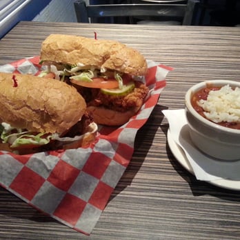 Tampa Tap Room - Fully-dressed Oyster Po'Boy with red beans & rice - Sports Bars Near Me - Tampa, Florida Tampa Tap Room - Fully-dressed Oyster Po'Boy with red beans & rice - Sports Bars Near Me - Tampa, Florida