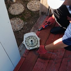 Backyard Pool & Spa Repair - Zahan checking the cover.