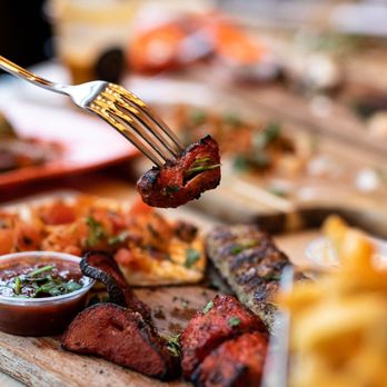 Naan and Kabob - a fork lifting up a piece of meat - Halal Near Me - Scarborough, Ontario Naan and Kabob - a fork lifting up a piece of meat - Halal Near Me - Scarborough, Ontario