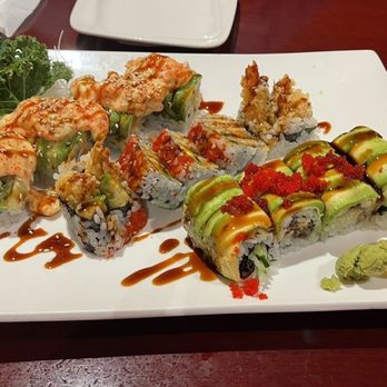 Pacific East - Manhattan Roll (back) Shrimp Tempura Roll (middle) Green Dragon Roll (front) - Japanese Near Me - Woodmere, Ohio Pacific East - Manhattan Roll (back) Shrimp Tempura Roll (middle) Green Dragon Roll (front) - Japanese Near Me - Woodmere, Ohio