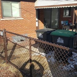 Taylor Fence Service - Brown vinyl chain link fence