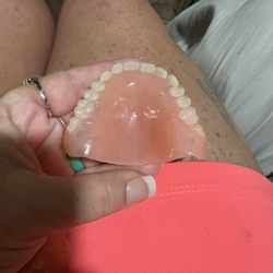 Hometown Dental of Jefferson City - Top Plate, literally half "teeth"