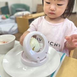 Guidepost Montessori at Katy - Guidepost Katy's Nido program serves infants from 6 weeks to 18 months. Food preparation is an engaging part of the curriculum!