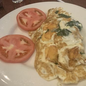 Silver Star Restaurant - Omelette with tomatoes inside of hash browns - Diners Near Me - New York, New York