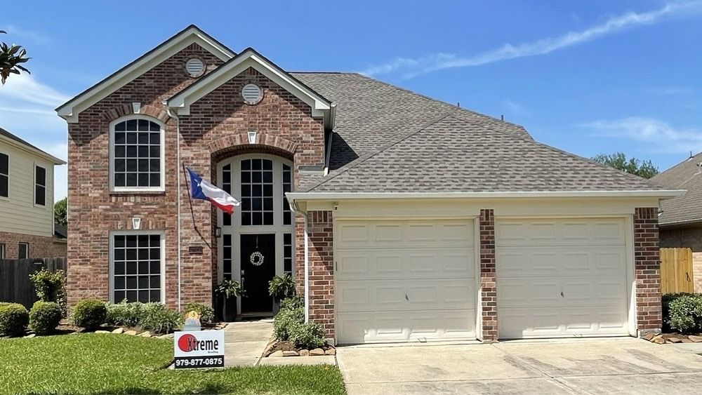 Slide of Xtreme Roofing