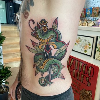 Stairs Tattoo - Snake and dagger side piece - Tattoo Near Me - Seattle, Washington