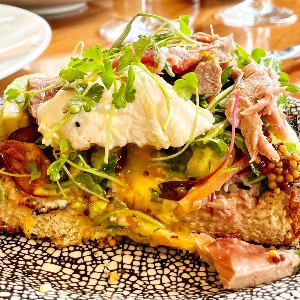 Reverence - TUNA CONFIT 'NICOISE" TARTINE sourdough, egg, olive, tomato, arugula, red onion, - New American Near Me - Atlanta, Georgia Reverence - TUNA CONFIT 'NICOISE" TARTINE sourdough, egg, olive, tomato, arugula, red onion, - New American Near Me - Atlanta, Georgia