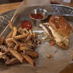 Tusk & Trotter American Brasserie Bentonville - Blackened chicken sandwich half