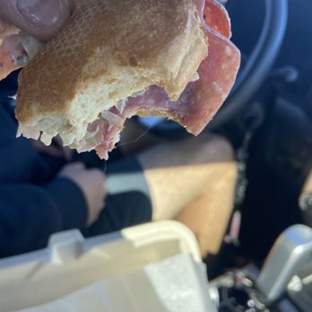 Firehouse Subs - a hand holding a half eaten sandwich - Sandwiches Near Me - Colorado Springs, Colorado Firehouse Subs - a hand holding a half eaten sandwich - Sandwiches Near Me - Colorado Springs, Colorado