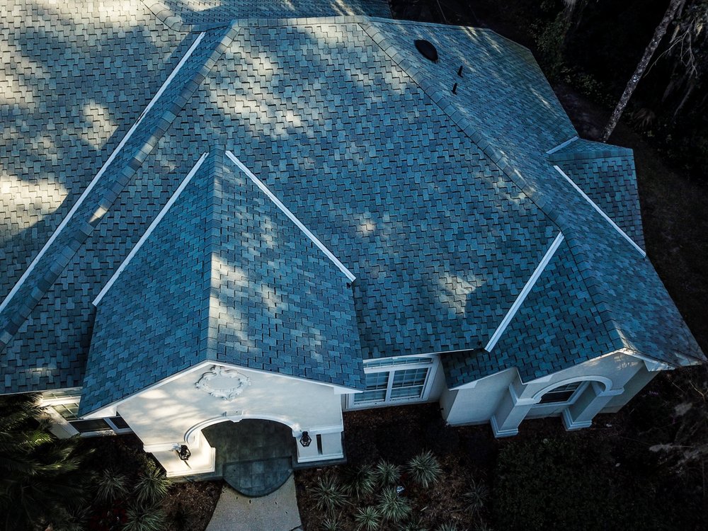 Slide of Action Roofing