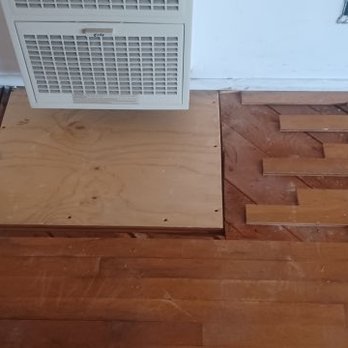 Oak Foliage Flooring - Whole sections of the flooring were missing where the old floor heaters had been. - Flooring Near Me - Granada Hills, California Oak Foliage Flooring - Whole sections of the flooring were missing where the old floor heaters had been. - Flooring Near Me - Granada Hills, California