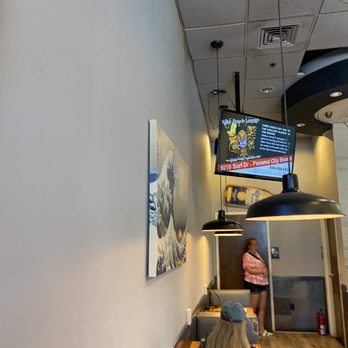 Great White Pizza - two people sitting in a booth - Pizza Near Me - Panama City Beach, Florida