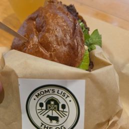 Grilled onions, Arugula, Patty, Cheese, on the most delicious bread! And the fries aren't greasy....just overall Great food! Grilled onions, Arugula, Patty, Cheese, on the most delicious bread! And the fries aren't greasy....just overall Great food!