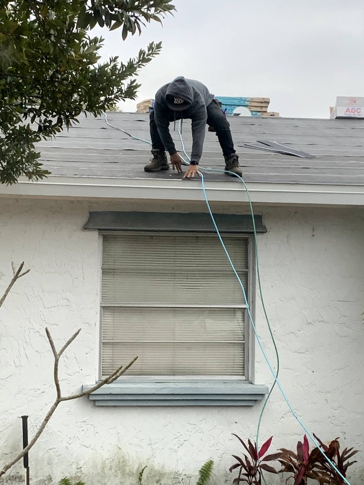 Slide of Pro-Master Roofing