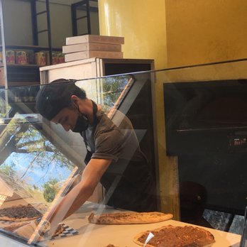The Block - Cutting up pizza, mask down - Mediterranean Near Me - Vienna, Virginia