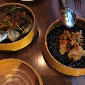Oloroso - Clams with Sherry & Squid Ink Rice with Calamari - Spanish Near Me - Philadelphia, Pennsylvania Oloroso - Clams with Sherry & Squid Ink Rice with Calamari - Spanish Near Me - Philadelphia, Pennsylvania