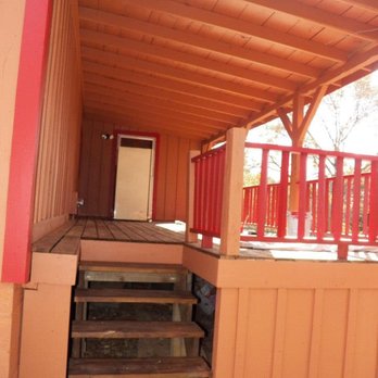 The Paint Guys - Full exterior of a Log cabin - Painters Near Me