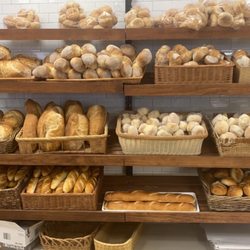 Central Ave Bakery - Beautiful wall of gluten  Above it would be a great place of a huge plaque or photo/story of this bakery