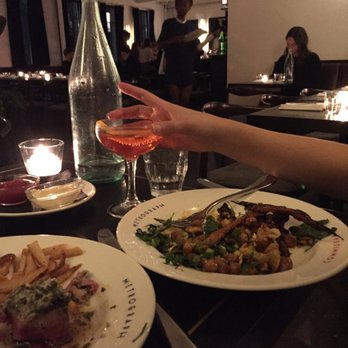 The Commissary at Metrograph - Having a lovely evening - cool vibe with people enjoying good food and conversation - New American Near Me - New York, New York The Commissary at Metrograph - Having a lovely evening - cool vibe with people enjoying good food and conversation - New American Near Me - New York, New York
