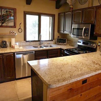 Wildflower Condominiums - #54 Wildflower- Kitchen with new stainless steel appliances and granite counter tops. Most all cooking utensils needed for a large diner. - Condominiums Near Me - Mammoth Lakes, California Wildflower Condominiums - #54 Wildflower- Kitchen with new stainless steel appliances and granite counter tops. Most all cooking utensils needed for a large diner. - Condominiums Near Me - Mammoth Lakes, California