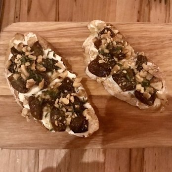 Cucciolo Osteria - Bruschetta with roasted grapes, walnuts, and goat cheese - Italian Near Me - Durham, North Carolina
