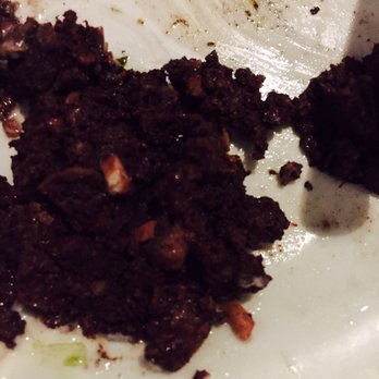 Renzo's - The inside of the morcilla seasoned to perfection and delicious, not rice. - Argentine Near Me - Tampa, Florida Renzo's - The inside of the morcilla seasoned to perfection and delicious, not rice. - Argentine Near Me - Tampa, Florida